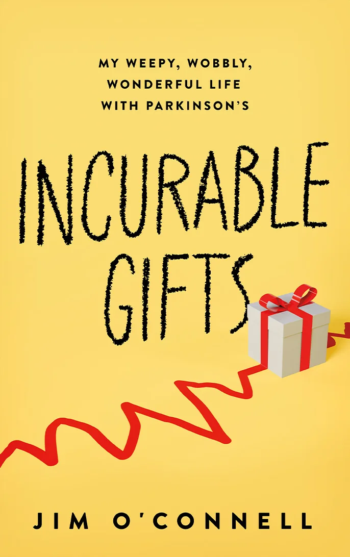 Cover of Incurable Gifts by Jim O'Connell. The art shows an EEG line that becomes the ribbon wrapping a gift box. The subtitle reads "My weepy, wobbly, wonderful life with Parkinson's."